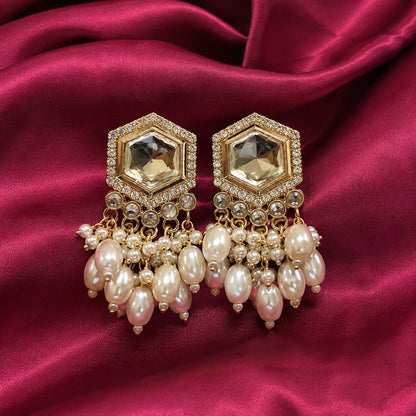 Gold-plated studs with a hexagonal champagne crystal and a cluster of oval faux pearls on magenta satin